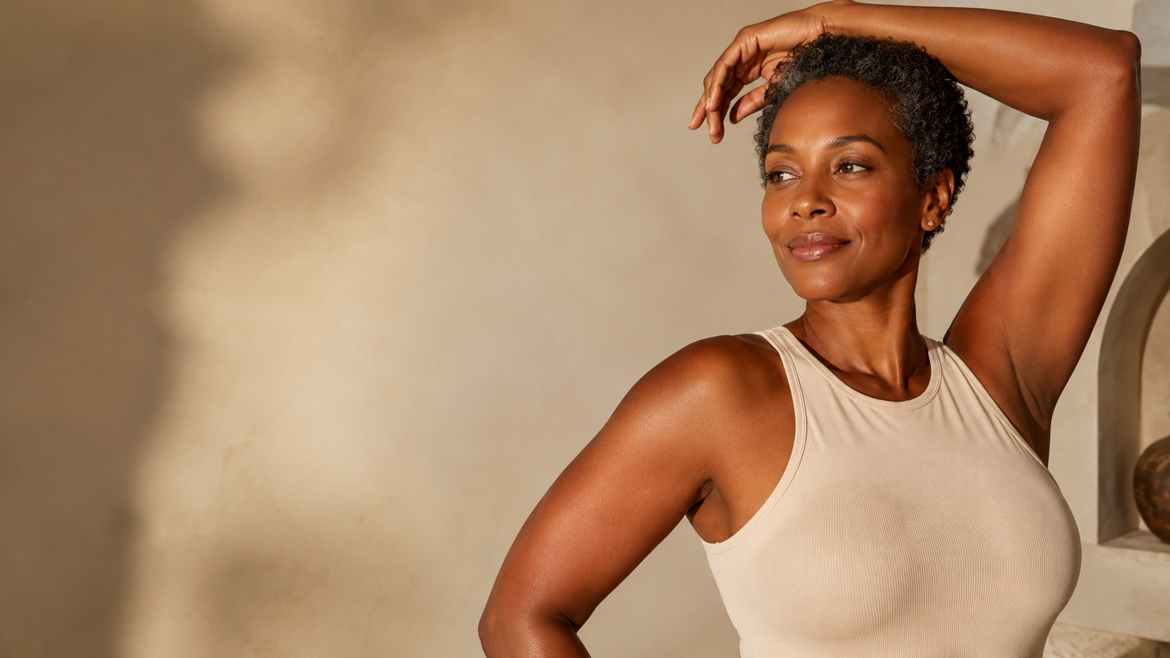 Woman with toned, refined upper arms illustrating arm lift results at Plastic Surgery of Austin