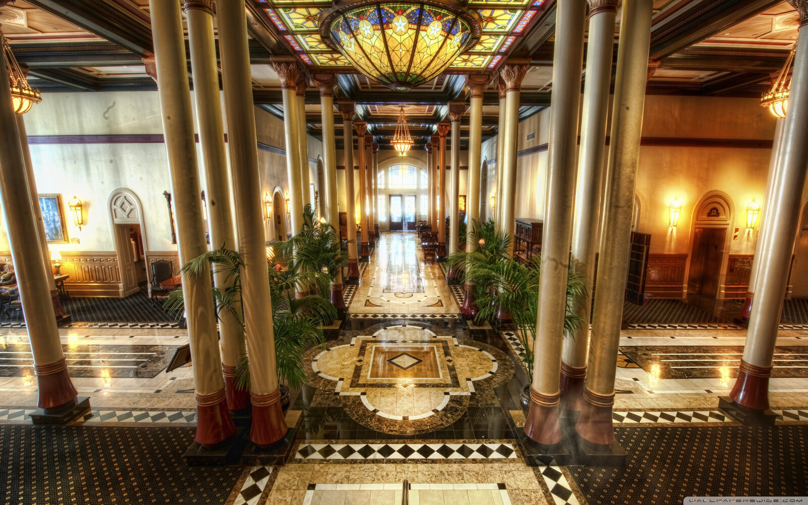 The grand historic lobby of The Driskill hotel in downtown Austin